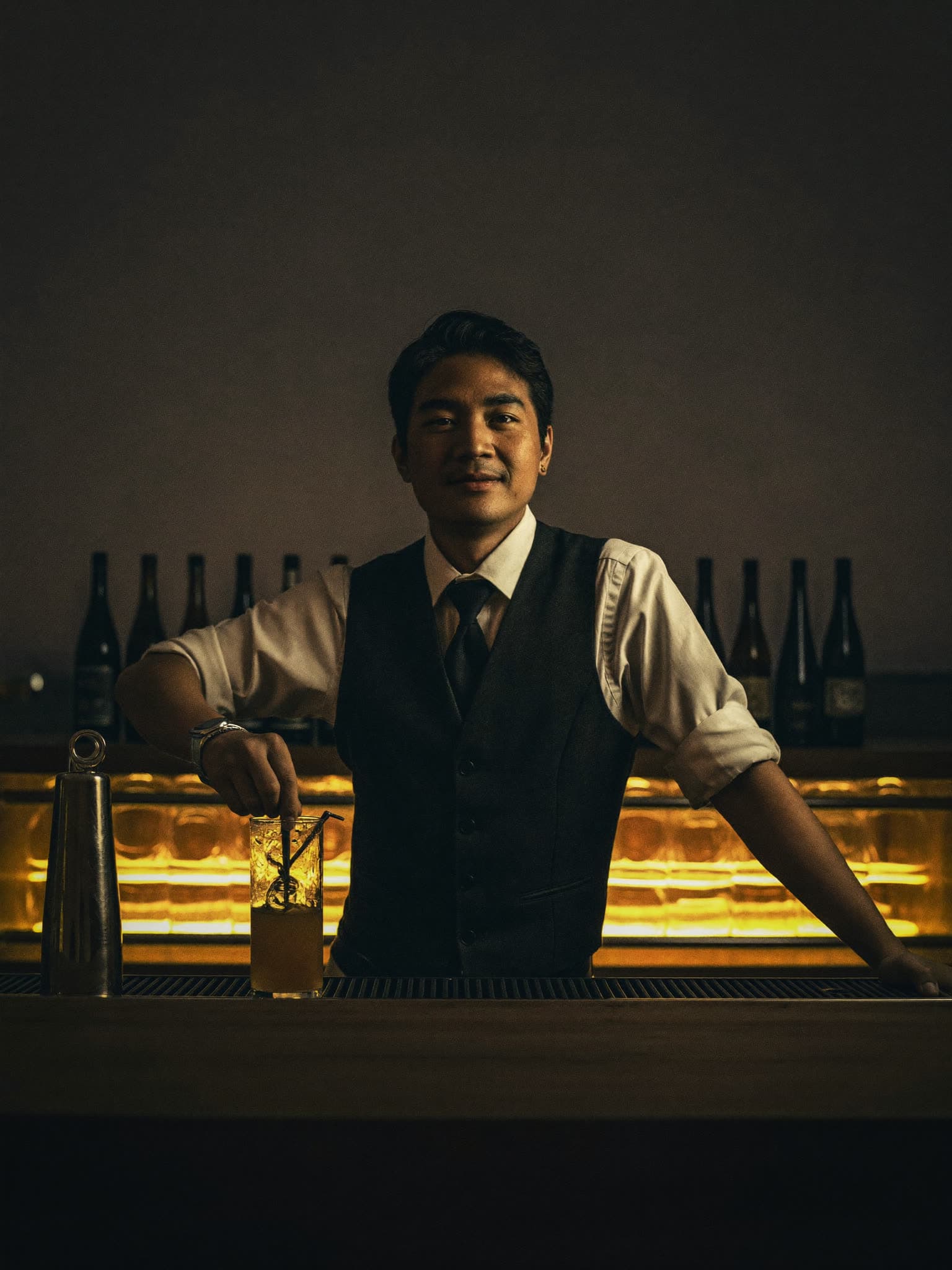 Our head bartender stirring a cocktail